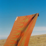 Australian wool blanket with red stripe, handmade in Melbourne